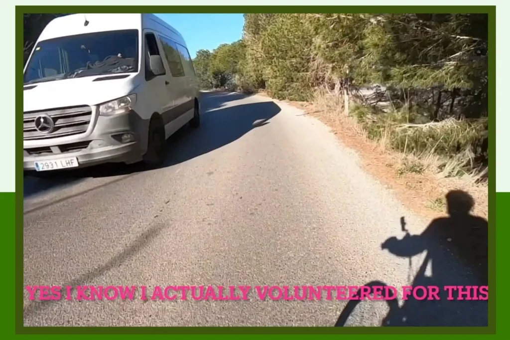 Climbing hill that runs beside highway outside Puntalón, Spain